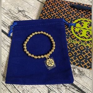 New! Gorgeous beaded, stretchy bracelet w/Tory Burch logo charm + Free gift wrap